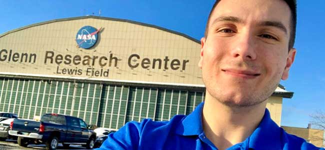 An bet365官网 engineering student outside of NASA Cleveland, where he is interning