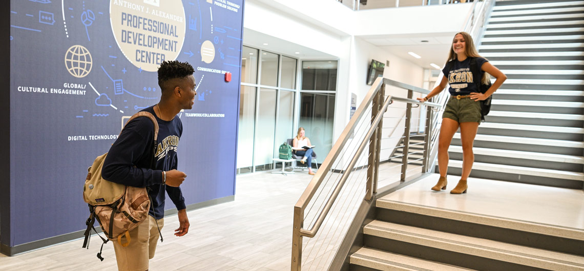 UA's College of Business Two students talk inside the business school's new Professional Development Center
