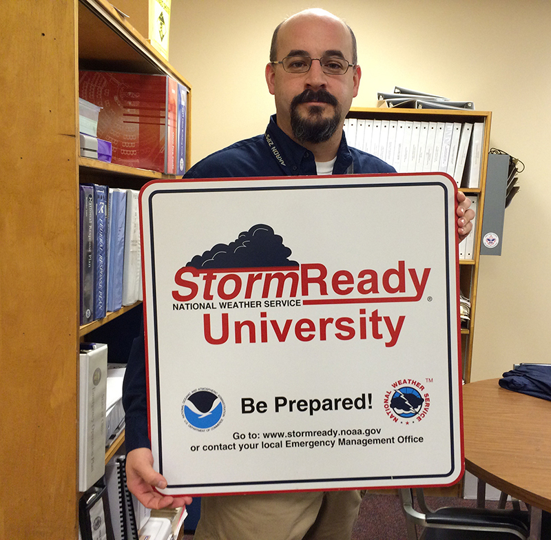 Mark Beers and StormReady sign