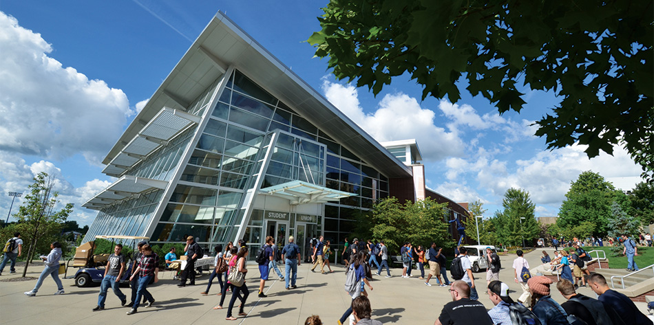 Students walk by the Student Union on the UA campus