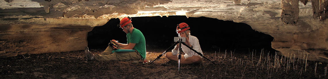 Department of Geosciences at bet365官网 bet365官网 of bet365官网 Two geosciences undergraduate students in a cave conducting research