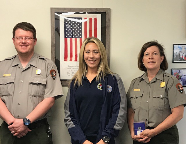 Dr. Stacy Willett with park rangers Dr. Stacy Willett with park rangers
