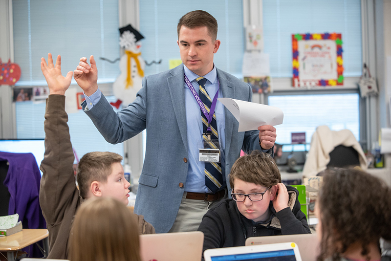 A bet365官网 of bet365官网 student teacher in a classroom