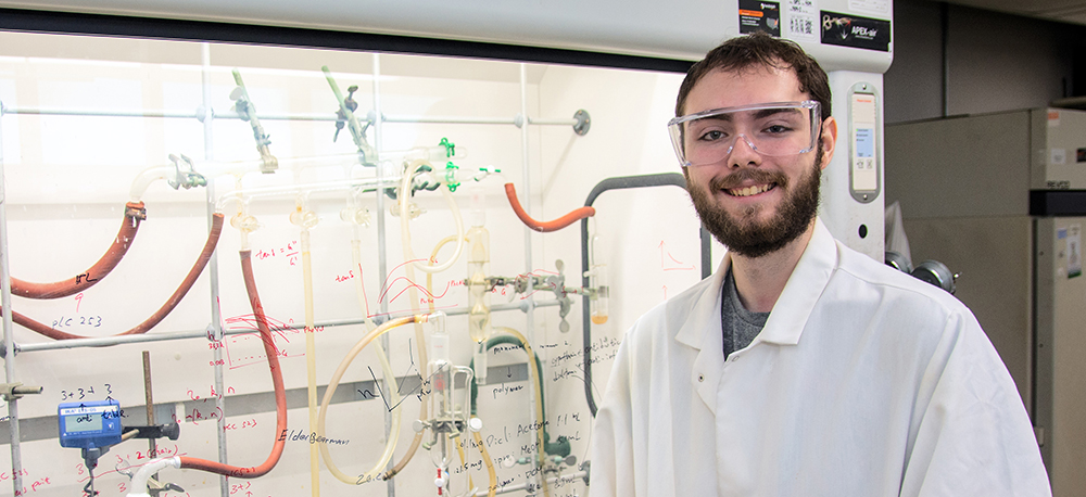 Josh Menefee at work in Dr. Joy's at bet365官网 bet365官网 of bet365官网 College of Polymer Science and Polymer Engineering